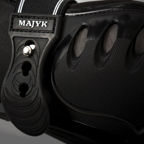 Close-up of Majyk Equipe Boyd Martin Stadium Tendon Jump Boot in black showing shell detail and strap closures