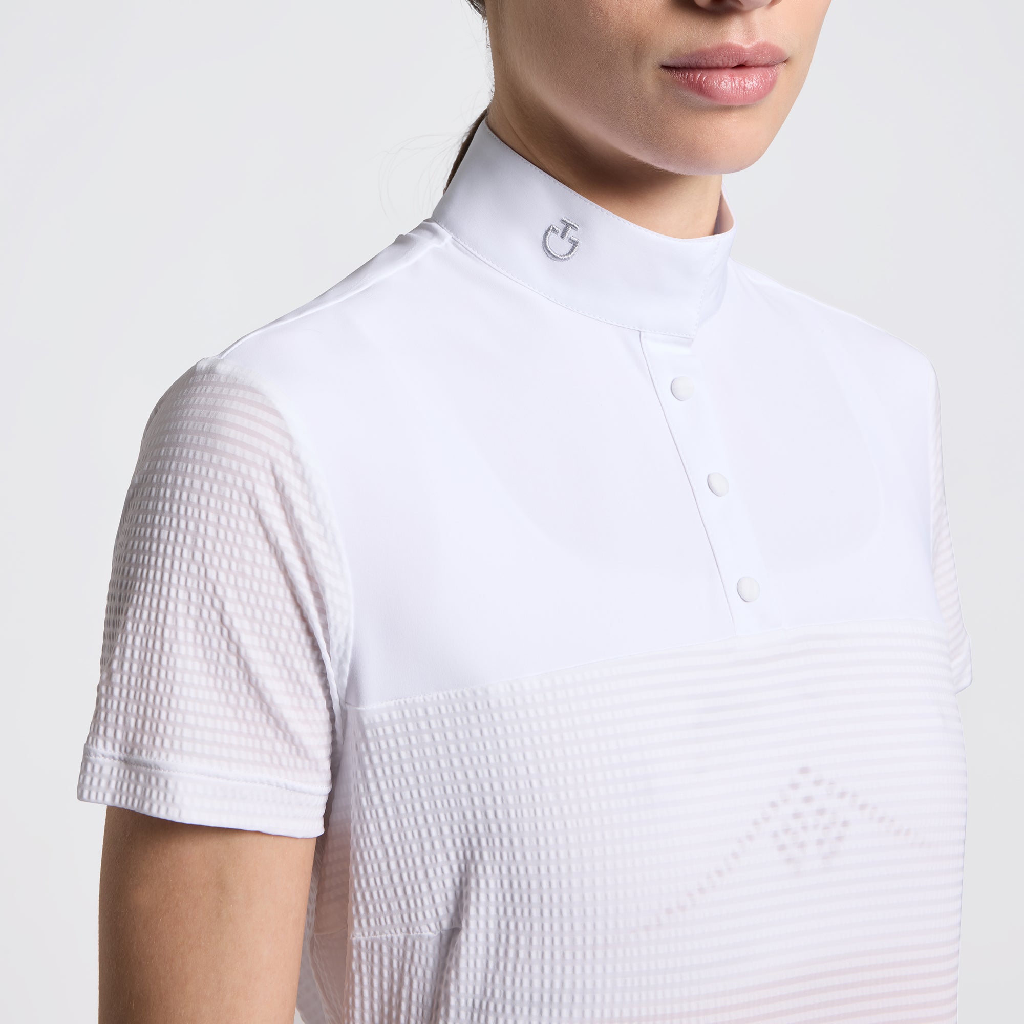 Close-up front view of a model wearing the white Cavalleria Toscana Short Sleeve Stripe Jersey Competition Shirt on a plain background