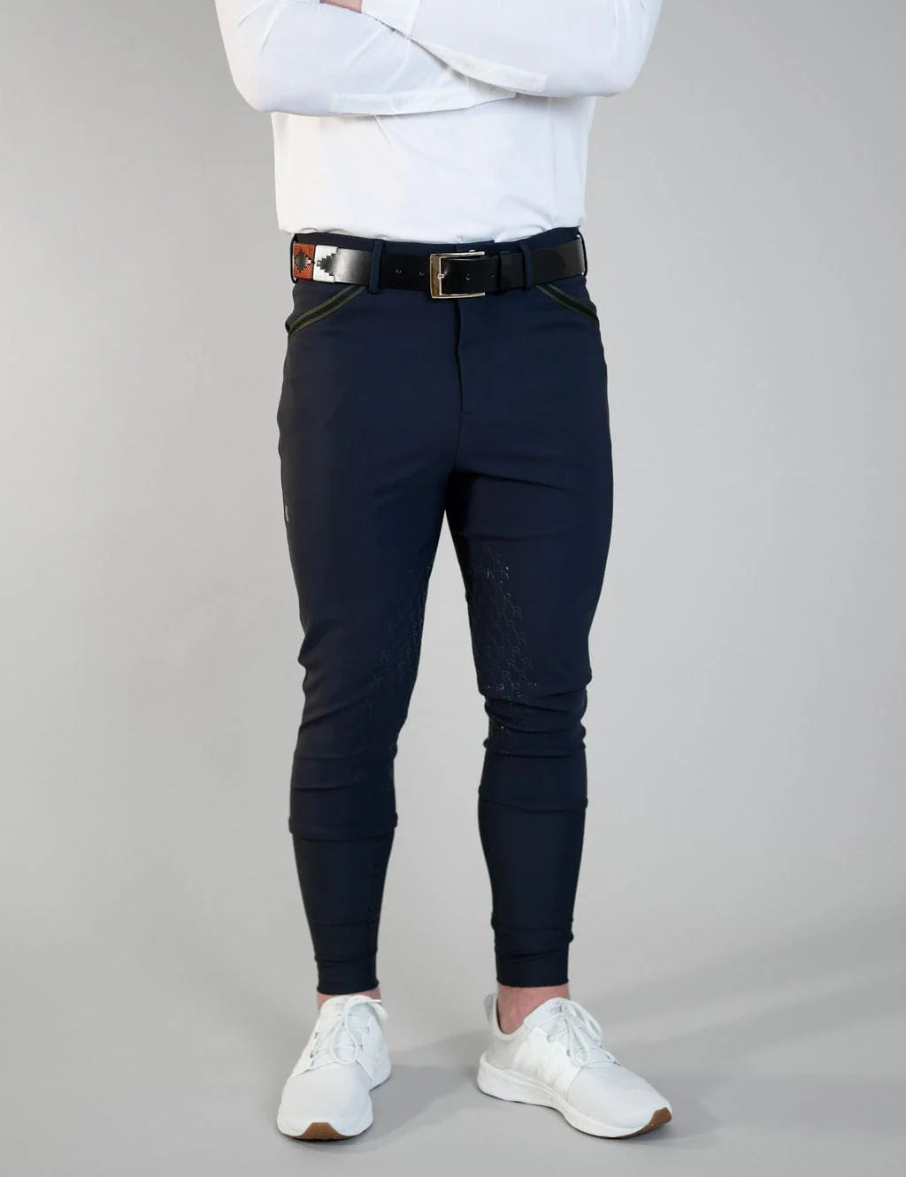Front view of a male model wearing the navy Free Ride Men's PRO Knee Patch Breeches on a plain background