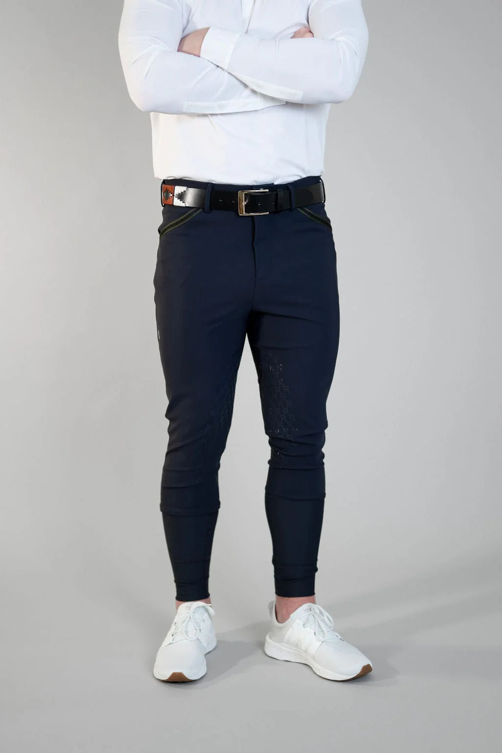 Front view of a male model wearing the navy Free Ride Men's PRO Knee Patch Breeches on a plain background
