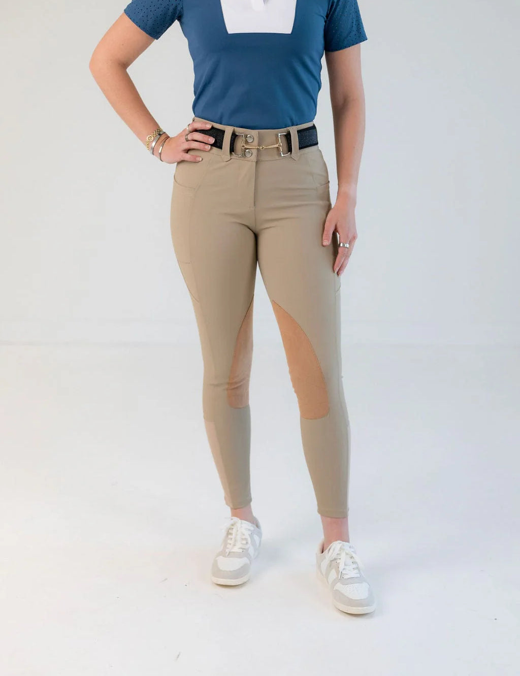 Front view of a model wearing the beige Free Ride PRO Knee Patch Breeches on a plain background