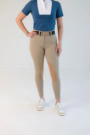 Front view of a model wearing the beige Free Ride PRO Knee Patch Breeches on a plain background