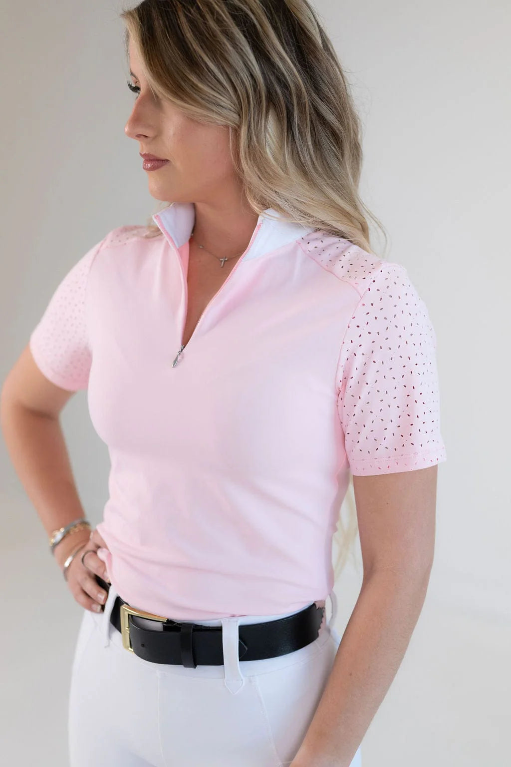 Close-up front view of the pink Free Ride Cassidy Short Sleeve Show Shirt on a plain background