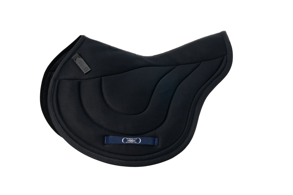 Side view of the black Correct Connect XC Mesh Saddle Pad on a white background