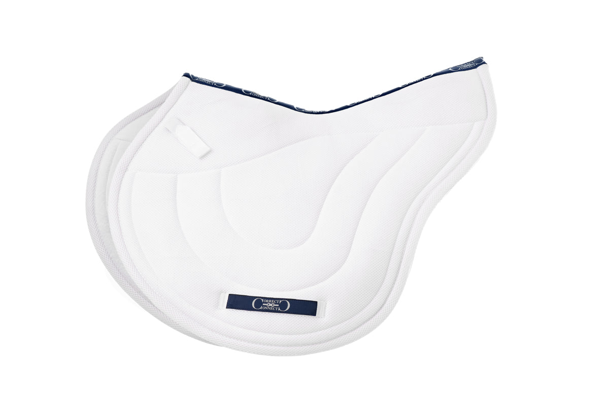 Side view of the white Correct Connect XC Mesh Saddle Pad on a white background