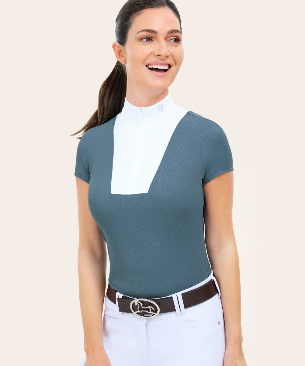 Woman wearing RJ Classics Celeste Show Shirt in Atlantic, front view with belt and breeches