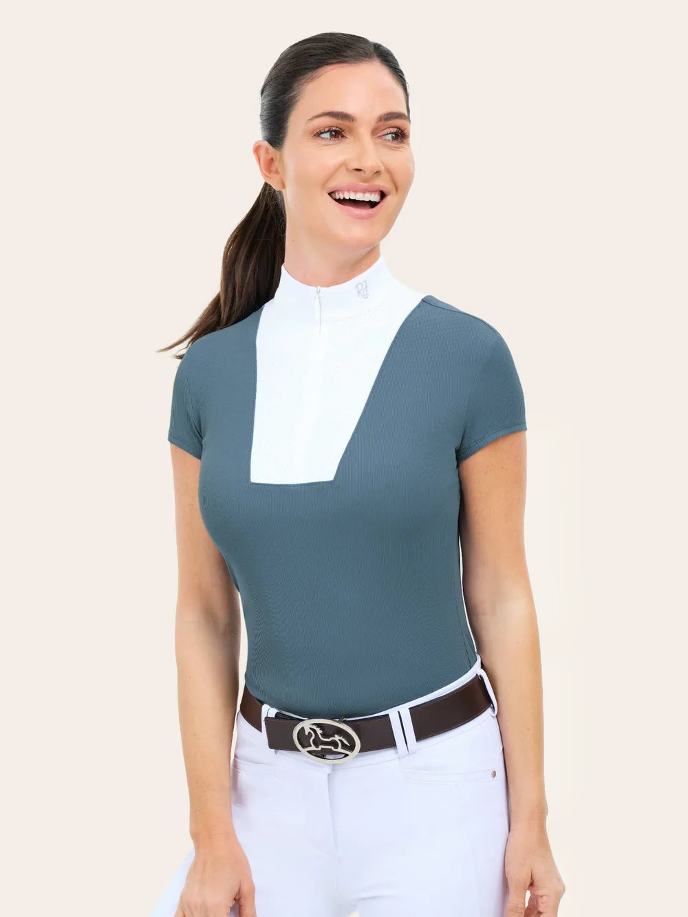 Woman wearing RJ Classics Celeste Show Shirt in Atlantic, front view with belt and breeches