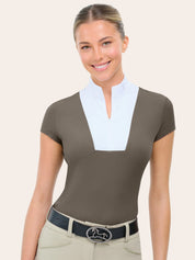Woman wearing RJ Classics Celeste Show Shirt in Taupe, front view with belt and breeches