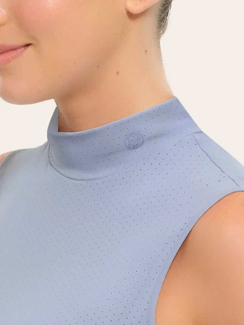 Close-up front view of a female model wearing the blue RJ Classics Corrie Mock Neck Shirt on a white background
