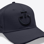 Close up view of the Cavalleria Toscana charcoal baseball cap with raised logo on front panel, angled view