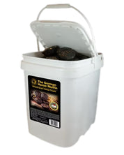 Angled front view of a 14 lb bucket of Equus Magnificus The German Horse Muffin on a white background