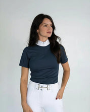 Front view of a female model wearing the navy Free Ride Cassidy Short Sleeve Show Shirt in front of a plain background