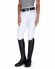 Angled front view of a model wearing the white Romfh Isabella Silicone Full Seat Breech on a white background