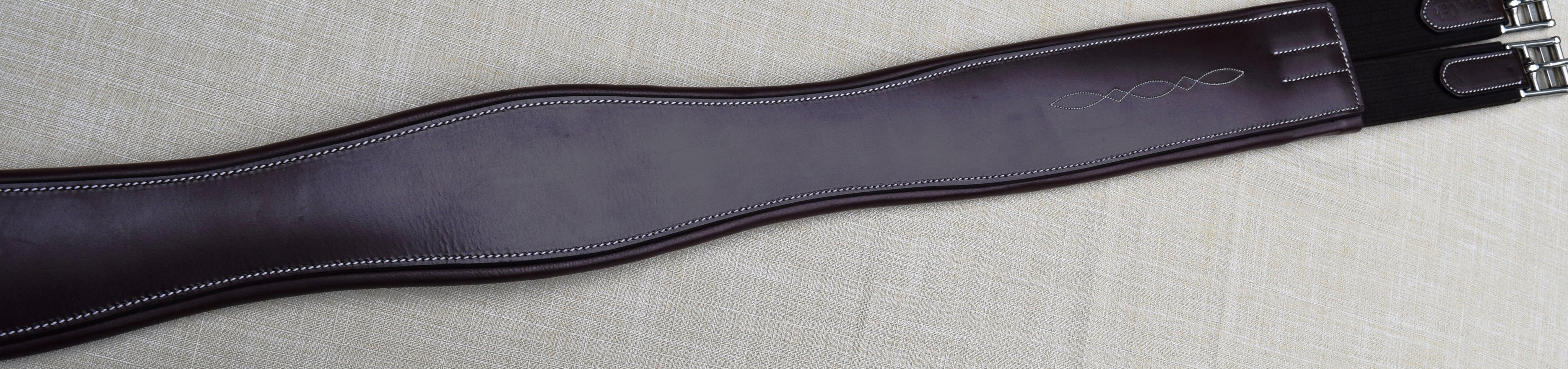View of the brown KL Select Black Oak Eco Fancy Hunter Girth on a plain background