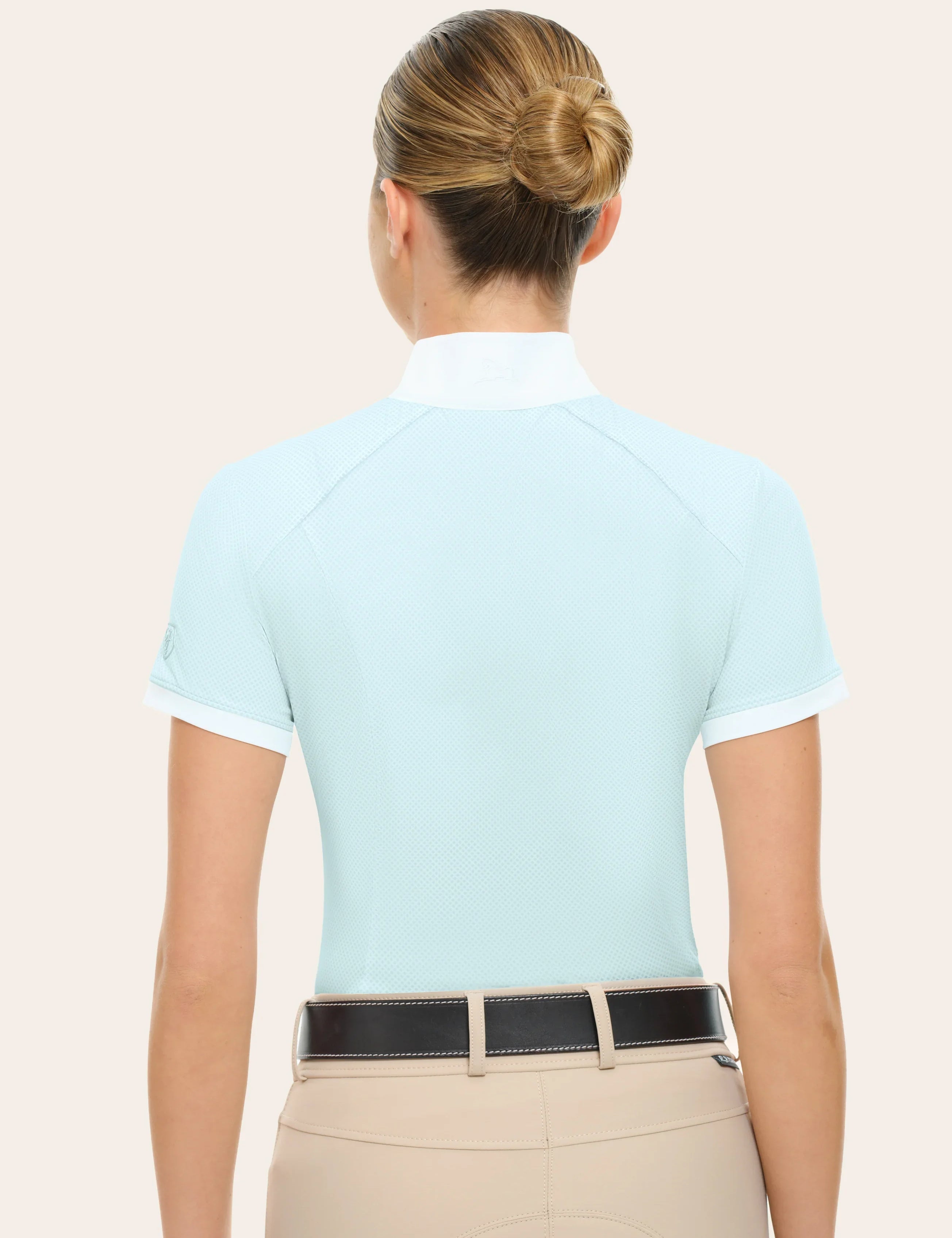 Back view of a female model wearing the blue RJ Classics Elsie Show Shirt on a plain background