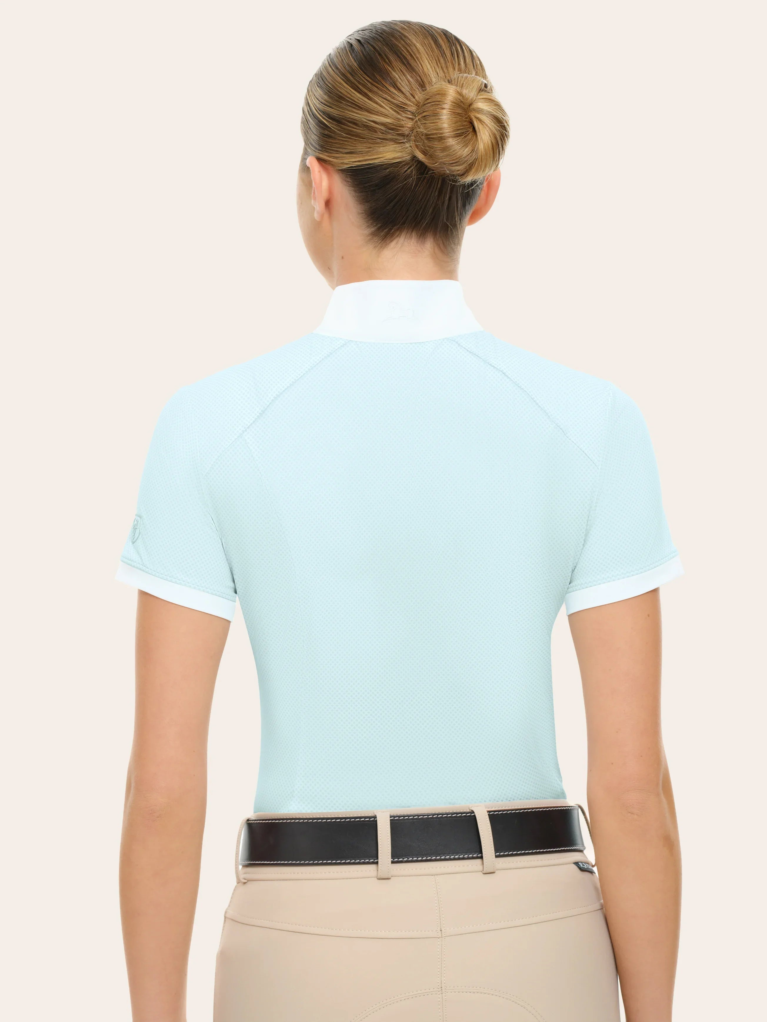 Back view of a female model wearing the blue RJ Classics Elsie Show Shirt on a plain background