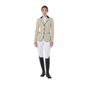 Full body view of model wearing the Equestro Women's Three-Button Competition Jacket in tan, white breeches, and black tall boots on a white background