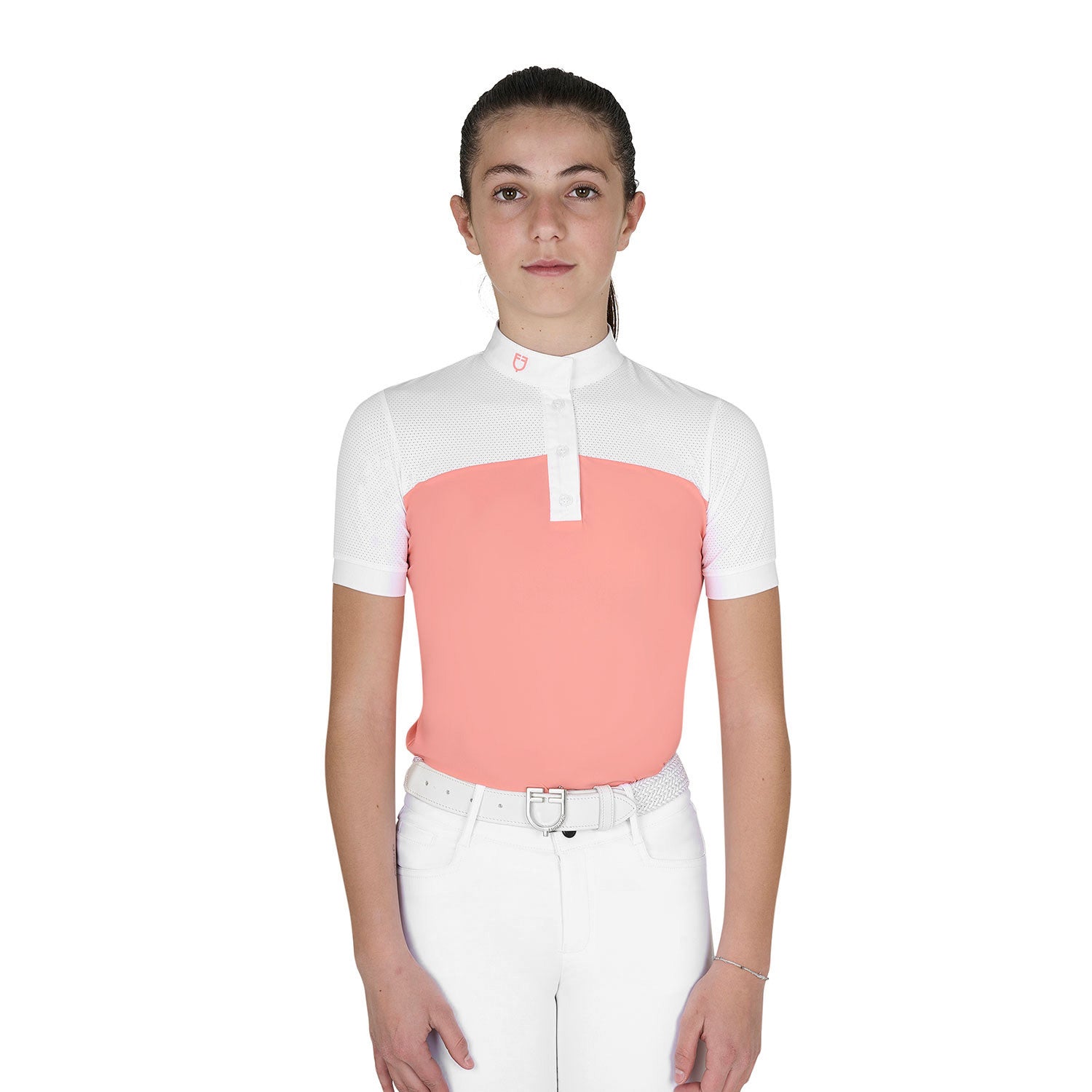 Front view of young model wearing the Girls' Slim Fit Competition Polo Shirt With Perforated Fabric in white and pink on a white background