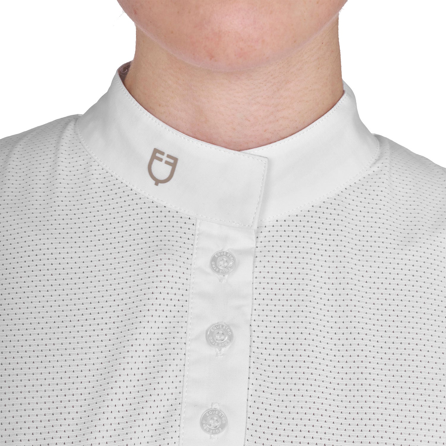 Close up front view of the white collar with tan logo on the Equestro Women's Slim Fit Polo Shirt In Technical Fabric And Mesh 