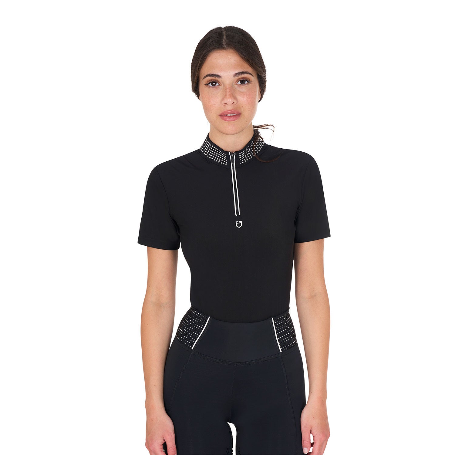 Front view of model wearing the Equestro Women's Slim Fit Training Polo Shirt With Zip And Collar Rhinestones in black on a white background