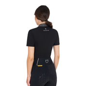 Back view of model wearing the Equestro Women's Slim Fit Training Polo Shirt With Zip And Collar Rhinestones in black on a white background