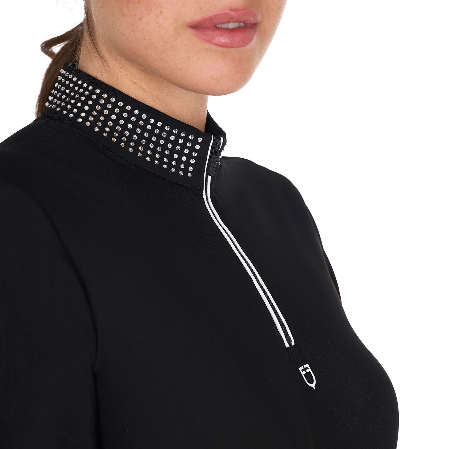 Close up front view of model the rhinestone collar and quarter zip of the Equestro Women's Slim Fit Training Polo Shirt With Zip And Collar Rhinestones in black on a white background