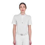 Front view of model wearing the Equestro Women's Slim Fit Training Polo Shirt With Zip And Collar Rhinestones in white on a white background
