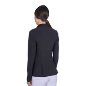 Back view of model wearing the Equestro Women's Competition Jacket With Zip And Buttons in black on a white background