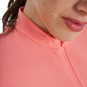 Close up front view of the collar of the Equestro Women's Training T-Shirt In Technical Fabric With Micro-Holes in pink on a white background