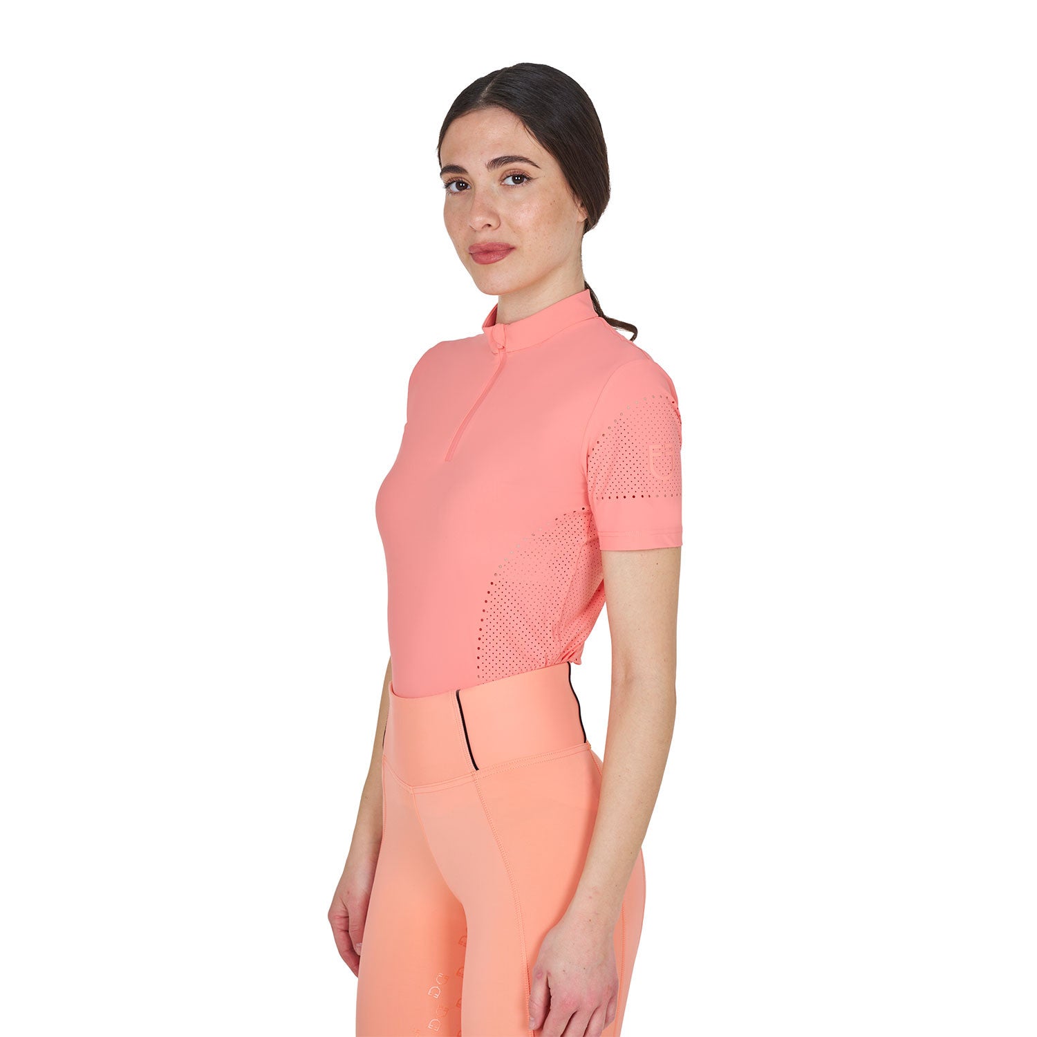 Angled front view of model wearing the Equestro Women's Training T-Shirt In Technical Fabric With Micro-Holes in pink on a white background
