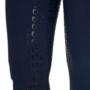 Close up view of the grip at the knee of the Equestro Women's High-Waisted Full-Grip Rhinestone Breeches in navy on white background