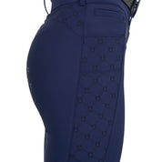 Close up view of the side of the Equestro Women's High-Waisted Monogram Breeches in navy on white background