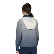 Back view of model wearing the Equestro Women's Water-Repellent Outerwear in ombre navy and white on a white background
