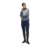 Full body view of model wearing the Equestro Women's Water-Repellent Outerwear in ombre navy and white, navy breeches, and black boots on a white background
