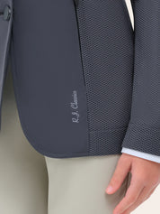 Close-up of the RJ Classics Harmony Evo Jr. Mesh Show Coat in Odyssey Grey showing the smooth front panel with RJ Classics logo print and the breathable mesh side panel fabric.