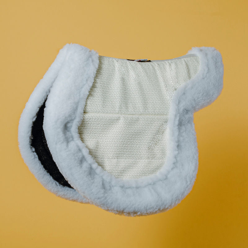 Side view of the pony Ecogold Secure Hunter Pad on a yellow background