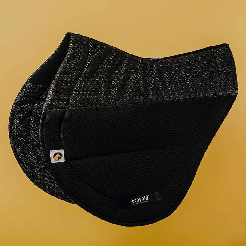 Side view of the black Ecogold Secure Cross Country Pad on a yellow background