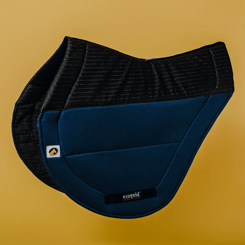 Side view of the navy Ecogold Secure Cross Country Pad on a yellow background