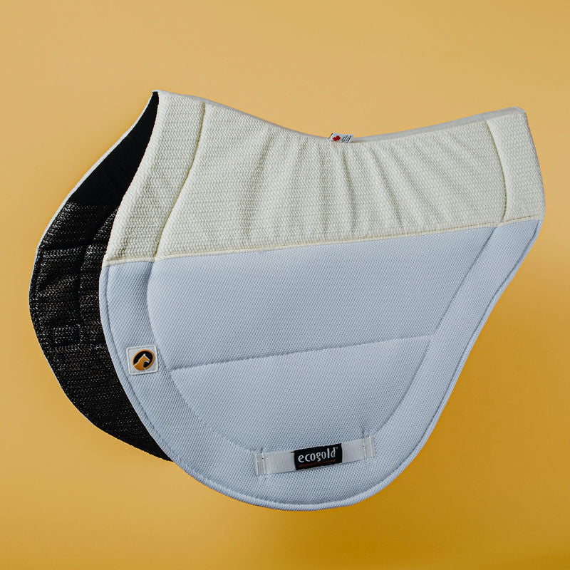 Side view of the white Ecogold Secure Cross Country Pad on a yellow background