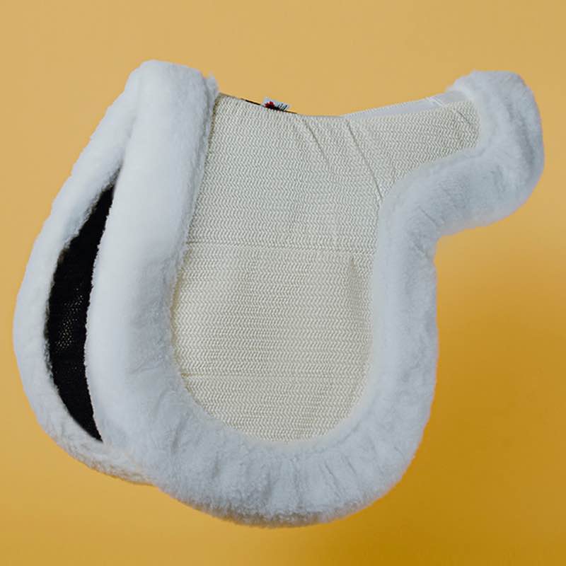 Side view of the Ecogold Secure Hunter Pad on a yellow background