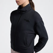 Close up angled front view a model wearing the Cavalleria Toscana Jersey Zip Sweatshirt in the color charcoal.