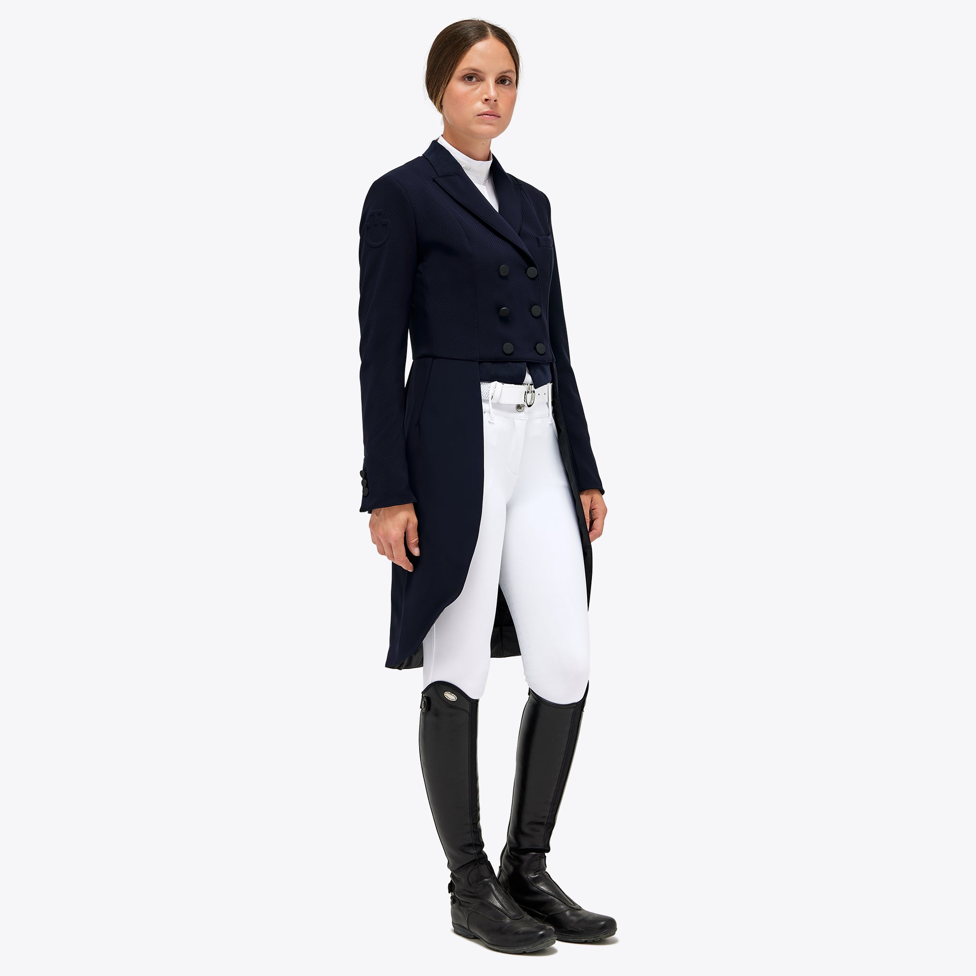 Cavalleria Toscana navy competition frack coat, angled front view, worn with white breeches and tall black riding boots