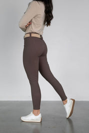 Side view of a model wearing the urban bronze Free Ride PRO Knee Patch Breeches on a plain background