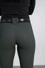 Close-up back view of the green Free Ride PRO Full Seat Breeches on a plain background