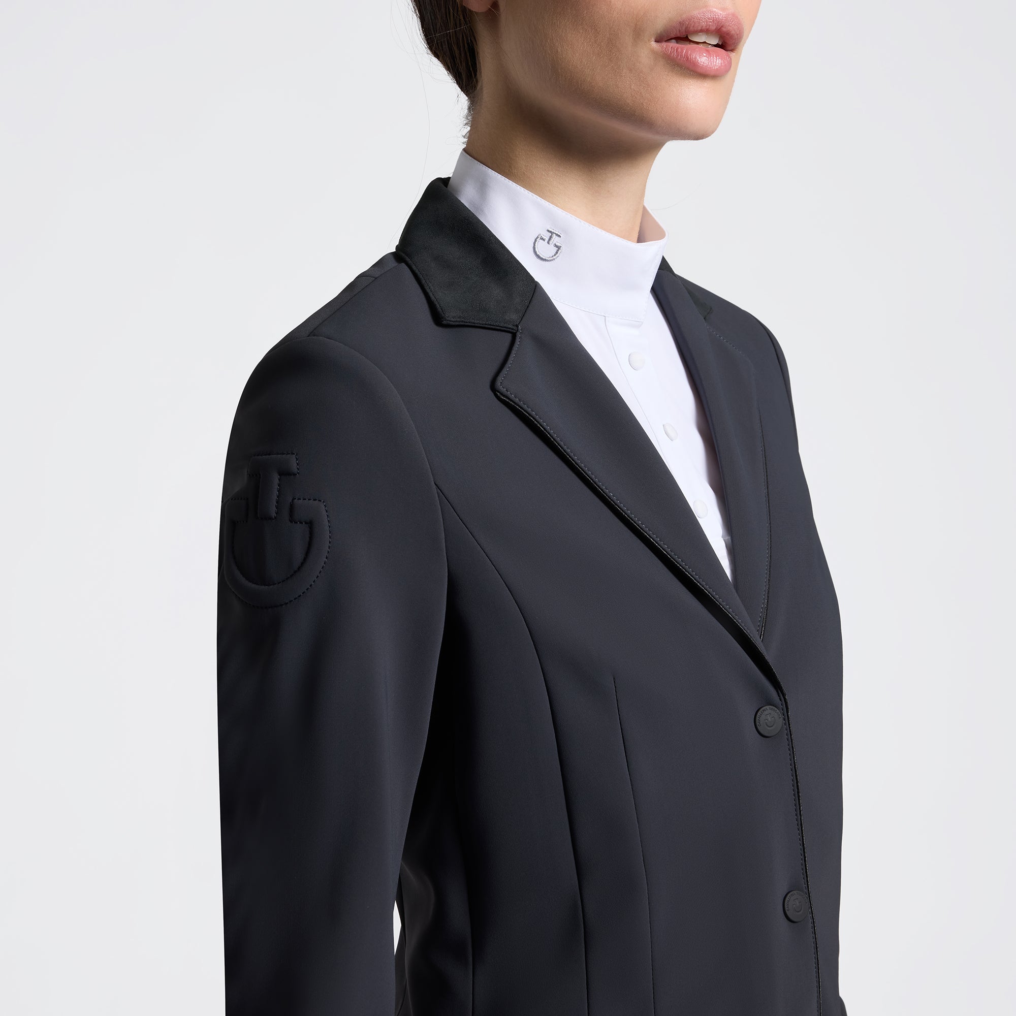 Close-up of Cavalleria Toscana charcoal zip competition jacket showing lapel and shoulder logo detail