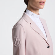 Close-up front view of a female model wearing the pink Cavalleria Toscana Raw Cut Competition Jacket on a plain background