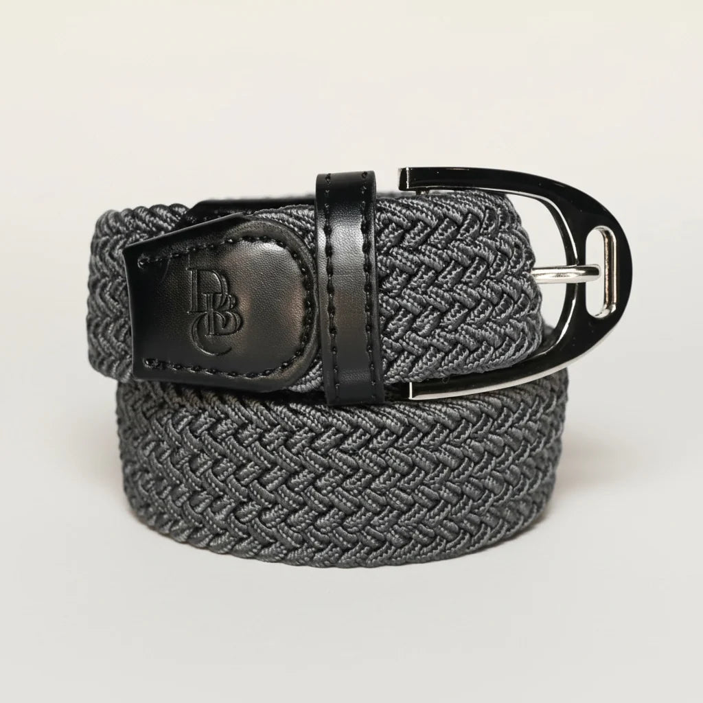 Front view of the coiled grey Dubois Cheval Stretch Stirrup Belt on a gray background