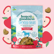 Front view of a bag of the apple flavored Honest to Goodness Upcycled Horse Treats on a pink background