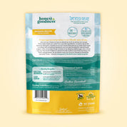 Back view of a bag of the banana flavored Honest to Goodness Upcycled Horse Treats on a yellow background