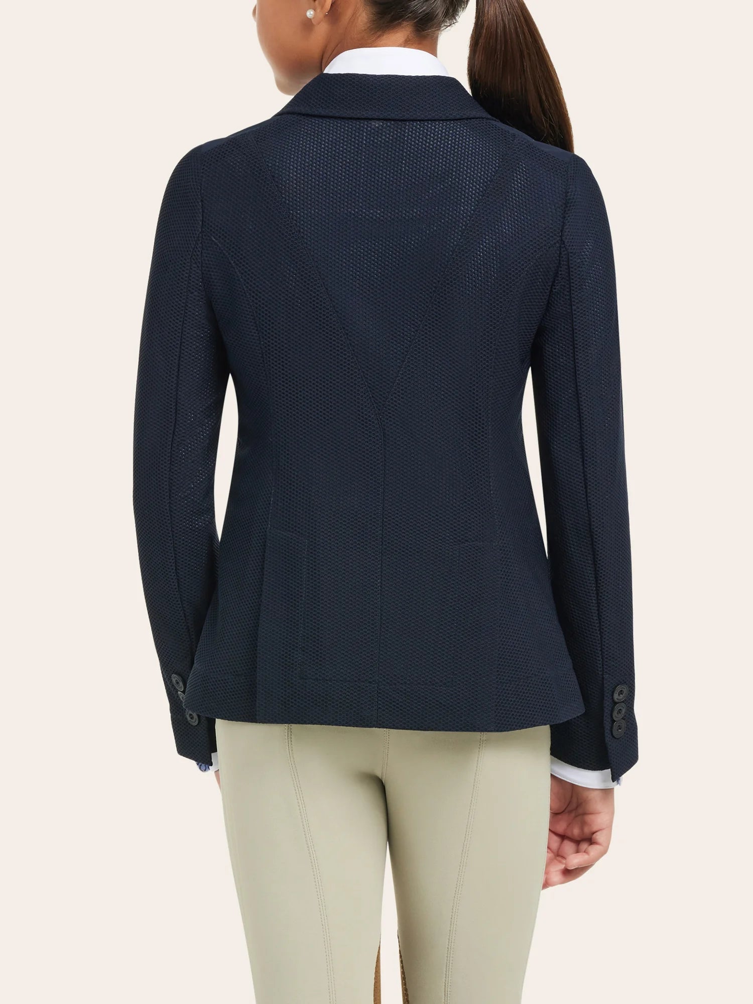 Child wearing Harmony Jr. 2.0 Mesh Show Coat in navy, back view